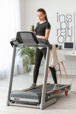 Woman Runs On Treadmill